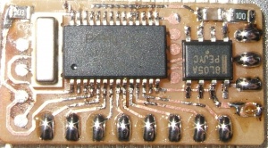 original SX print for the wireless display, showing the SX, a regulator, resonator and "programmer pads" where the SX-Key device is pressed. The 433Mhz receiver is not shown in this image.